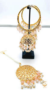 Earrings With Tikka: Rosegold pearls work Jadau work Beautiful jhumka balian with tikka set