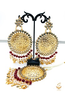 Punjabi Earrings: Maroon with kundan gold plated (artificial) round Pipal Patti punjabi earrings & tikka set
