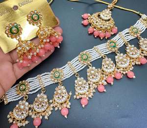 Choker Necklace: Kundan stone with pearls beaded choker set with beautiful earrings & tikka
