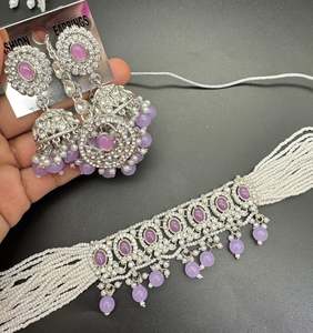Choker Necklace: Beautiful silver jerkan stones and white pearls work classy choker set with beautiful earrings & Tikka
