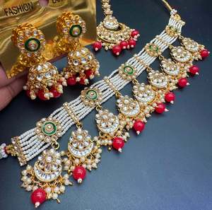 Red Beautiful Kundan and pearls work classy choker set with beautiful earrings & Tikka