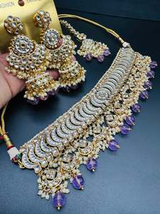 Kundan with pearls work beautiful heavy work choker necklace with designer Jhumk&hellip;