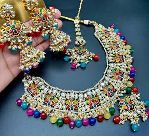 Kundan with pearls work beautiful heavy work necklace with designer Jhumka Earri&hellip;