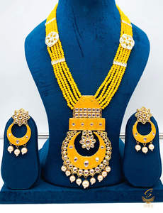 Rani Haar Long Necklaces: Mustard colour meenkari with kundan work pendant Long rani haar with pearl work set with beautiful design earrings