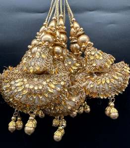 Latkans: Beautiful golden design medium size lehnga latkans tessels (pair)
