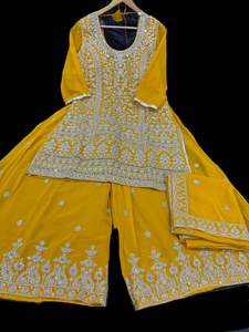 Sharara Lehnga Suits 1: (Video clip attached) Yellow color georgette based all over stones with Mirror work & embroidery work kameez with embroidery work big flared plazo and georgette dupatta with embroidery work (size 44 and can be altered upto size 46)