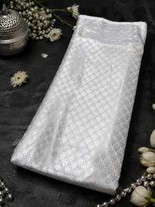 Fabrics: Silver Brocade silk Fabric (price per meter) perfect for stitching blouses /skirts /suits (aprox 112cm width )slight variation in color may occur