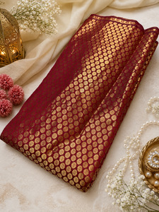 Fabrics: Maroon Brocade silk Fabric (price per meter) perfect for stitching blouses /skirts /suits (aprox 112cm width )slight variation in color may occur