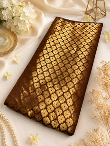 Fabrics: Brown Brocade silk Fabric (price per meter) perfect for stitching blouses /skirts /suits (aprox 112cm width )slight variation in color may occur