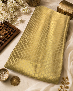 Fabrics: Golden brocade silk Fabric (price per meter) perfect for stitching blouses /skirts /suits (aprox 112cm width )slight variation in color may occur