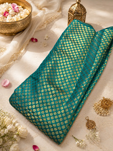 Fabrics: Peacock teal brocade silk Fabric (price per meter) perfect for stitching blouses /skirts /suits (aprox 112cm width )slight variation in color may occur