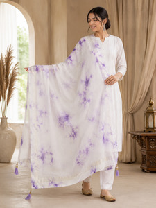 Plain Dupatta: Soft and elegant organza dupatta featuring a beautiful lavender tie-dye print, shimmering golden zari border, and premium handcrafted tassel detailing(slight variation in color and design is possible)