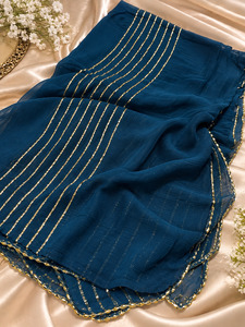 Womens: Elegant chiffon dupatta with delicate gold stripe detailing. Lightweight, flowy and perfect for festive or party wear.slight variation in color & design is possible