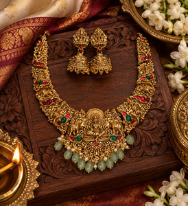 Elegant matte gold-finish Temple Jewellery Set featuring an intricate Goddess La&hellip;