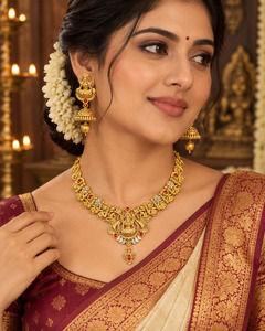 Elegant matte gold-finish Temple Jewellery Set Goddess Lakshmi motif with beauti&hellip;