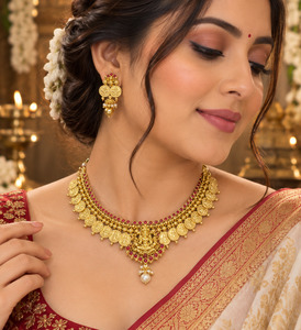 Elegant gold-finish Temple Jewellery Set Goddess Lakshmi motif with beautifully &hellip;