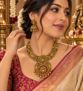 Elegant matte gold-finish Temple Jewellery Set Goddess Lakshmi motif with beauti&hellip;