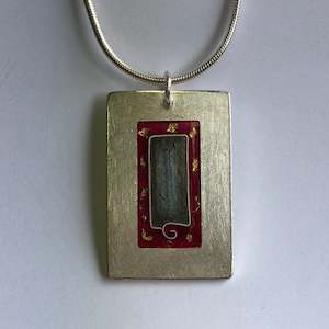 Pendant, red and grey with gold