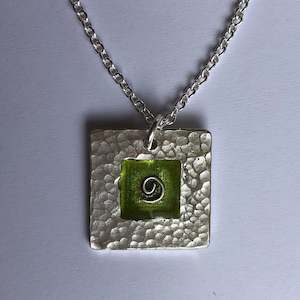 pendant, hammered, green koru