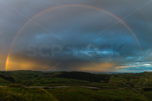 A rainbow over the Tukituki valley, Hawke's Bay, New Zealand - SCP Stock