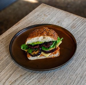 Products: Eggplant, Sundried Tomato, Falafel, Tomato Jam & Hummus on Ciabatta (Vegan)