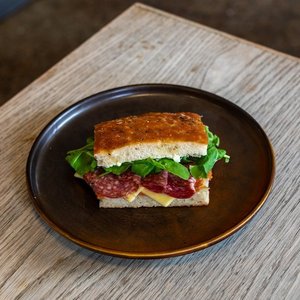 Salami, Tasty Cheese, Tomato jam, Rocket, Basil mayo on Schiacciata