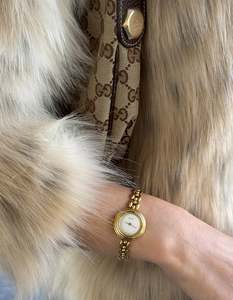 Sold: Gucci Gold Link Changeable Bezel