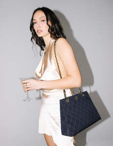 New Arrivals: Chanel Black Quilted Canvas Chain Tote