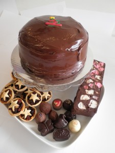 Products: Large chocolate cake, 12 Christmas Mince Pies, Rocky Road, 10 Belgian Chocolates – Send A Chocolate Cake