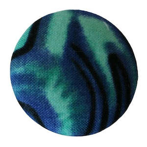 Badges: Blue paua badge