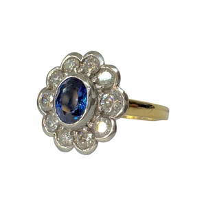 Products: Blue Sapphire and Diamond Cluster Ring