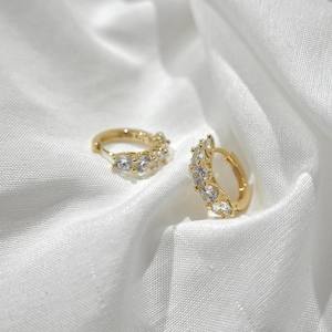 Accessories: Gregory Ladner Huggie CZ Earring