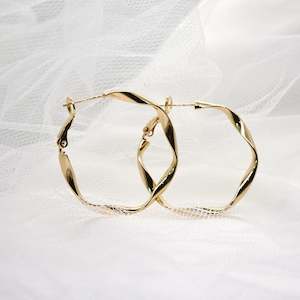 Jewellery: Gregory Ladner Wavy Hoop Earring