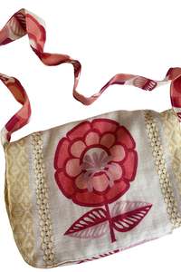 Reversible floral cross body bag