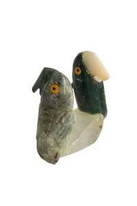 Decor: Beautiful jade crystal cockatoo's on quartz crystal