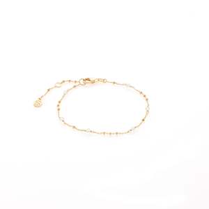 Gifts Under 200: Dotty Bracelet Crystal Quartz + Gold