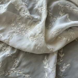 BEADED CREPE IN IVORY
