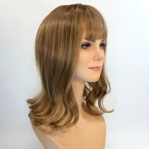 Products: Light brown with mid brown roots hard front Sole Wig Works