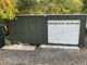 Roller Door with centre lock 1.5 x 2m Solid Sheds
