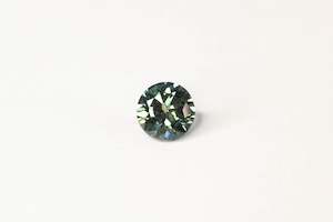 Gemstones: 5.9mm 0.96 carat Round-Cut Green Sapphire