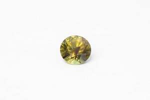 Gemstones: 7mm 1.56 carat Round-Cut Green Sapphire