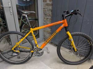 In Stock: Orange Cannondale F1000 SL, 18 inch - Medium