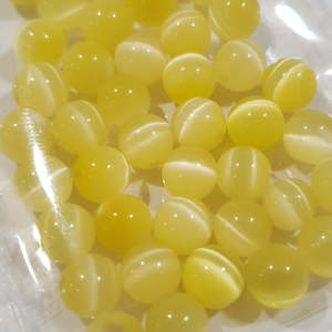 Catseye Beads: Catseye, Yellow, 6mm (40pcs) Only 1 packet available.