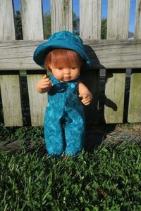 Products: Doll overalls and hat. Blue/green, fits 38cm Miniland dolls