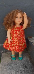 Products: Red Dress, pinafore style, fits 46cm doll