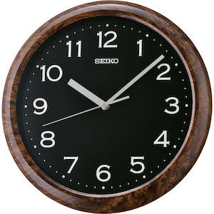 Clocks: Seiko Wood patterned Case  Clock QHA014Z