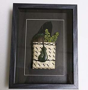 Framed New Zealand Greenstone Fish Hook with Feathers & Kete