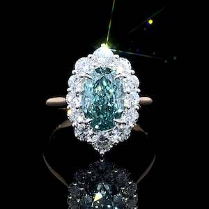 Diamond Rings: Teal Diamond Halo Ring