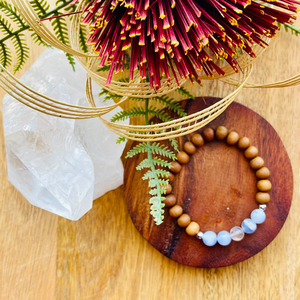 Products: Sandalwood, Clear Quartz & Blue Lace Agate Crystal Bracelet Strength Within