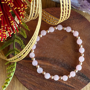 Products: Rose Quartz and Hematite Crystal Stretch Bracelet Strength Within